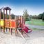 Fortress playhouse with slide on a playground