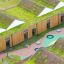 Round trampoline (150 cm) on modern playground surface with geometric play elements
