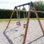Children's Double Baby Swing with wooden frame on playground.