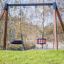 Double Swing with a tire and seat swings in a park