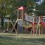 Children's playground with Double Swing and climbing structure.