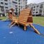 Galapagos wooden playhouse with slide in modern residential area