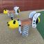 Two Bee Rocking spring riders in a playground.