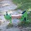 Spring rider in the shape of a grasshopper on a playground.