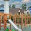Grasshopper rocking spring rider on playground with slide and climbing structure