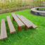 Outdoor wooden benches in playground.