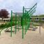 Green outdoor Grandis Training Set in a playground.