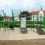 Outdoor fitness equipment - Grandis Training Set in a playground setting.