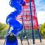 Colorful playground equipment with Bise climbing net and blue spiral slide