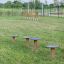 Four Agility Mini Stepping Platforms on a grassy field
