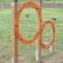 Agility Double Hoop Jump outdoor exercise equipment for dogs in a grassy area