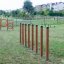 Agility Weave Poles outdoor exercise equipment for dogs in a park setting