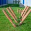Wooden climbing playground equipment Mojave (6 pcs set) installed on a grass field.