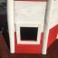 Lighthouse single playhouse, climbing net, red and white playhouse window view