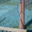 Triple Hammock mounted on a wooden post with metal chain support