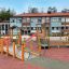 Epsilon inclusive playground in a public outdoor area.