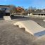 Concrete skate ramp Bump in a park.