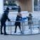 Wheelchair Accessible Merry-go-round (2-person) playground equipment with metal rails and blue seats