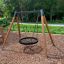 Bird Nest Single Swing (BNS 120 cm) in a outdoor playground setting.