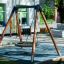 Bird Nest Single Swing (BNS 120 cm) installed in a playground.