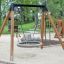 Bird Nest Single Swing (BNS 120 cm) in a children’s playground.