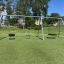 Metal Swing Frame Bird Nest 1 (BNS 120 cm) + 2 swings in a park.