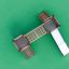 Mini Play II playground for children with wooden climbing structures and metal slide on green surfac