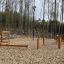 Obstacle course with mini climbing net in forest.