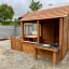Wooden Garden Playhouse with Fencing.