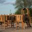 Challenger Modern Nature single slide wooden playground equipment with climbing elements and slide o