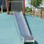 Outdoor Hill Slide h120 on blue mound with green lawn
