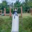 Child playing on Hill Slide h120 in a park.