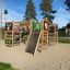 Wooden Forest Castle with slide on a playground.