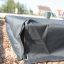 Sandbox cover 3m x 3m secured with a strap in a park setting.