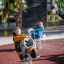 Children playing on Walrus rocking spring riders at a playground.
