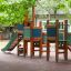 Tower with Slide wooden playground structure with climbing walls and green slide