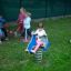 Child playing on Whale Rocking spring rider in a playground.