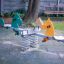 Double Pony rocking playground seesaw in a garden setting