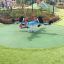Children's playground featuring the Quadro Walrus-Seal rocking toy.