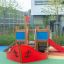 Small Ship sandbox at a modern playground with vibrant red and blue colors.