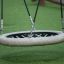 Single Swing playground rope tire swing close-up.