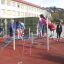 Children playing on Starfish steel structure playground equipment.