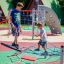 Starfish steel structure playground equipment with children climbing and balancing on nets and platf