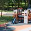 Spinner I playground equipment with children playing on a round spinning platform