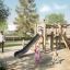Alstad Eco playground set with children playing and parents watching in a park