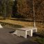 Double Quarter-Pipe skate ramp in a natural park setting