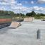 Skatepark with Spine-Ramp and other skateboarding elements.