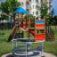 Playground featuring Merry-Go-Round and colorful play structures