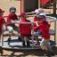 Children playing on Merry-Go-Round playground equipment.