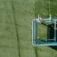 Sensory Box playground equipment with climbing and interactive elements viewed from above on green g